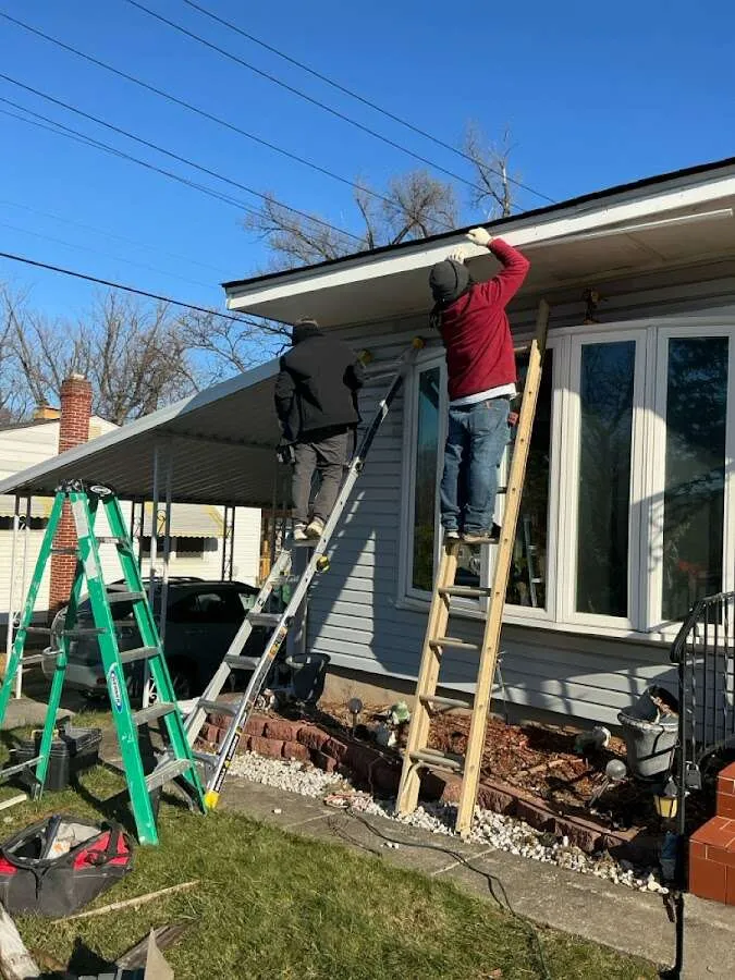 Restoration crew performing exterior repair in Brunswick